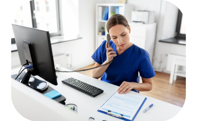 Image of a nurse on the phone, providing empathetic support and guidance for Alzheimer's and dementia care inquiries.
